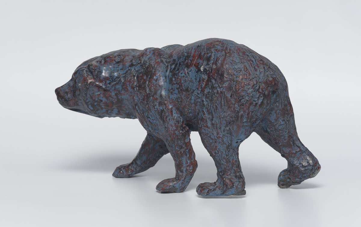 Bear — Walking bear, head thrust forward
